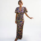 Midi dress with puff sleeves, V-neck, ruched waist; multicolor pattern in green and purple