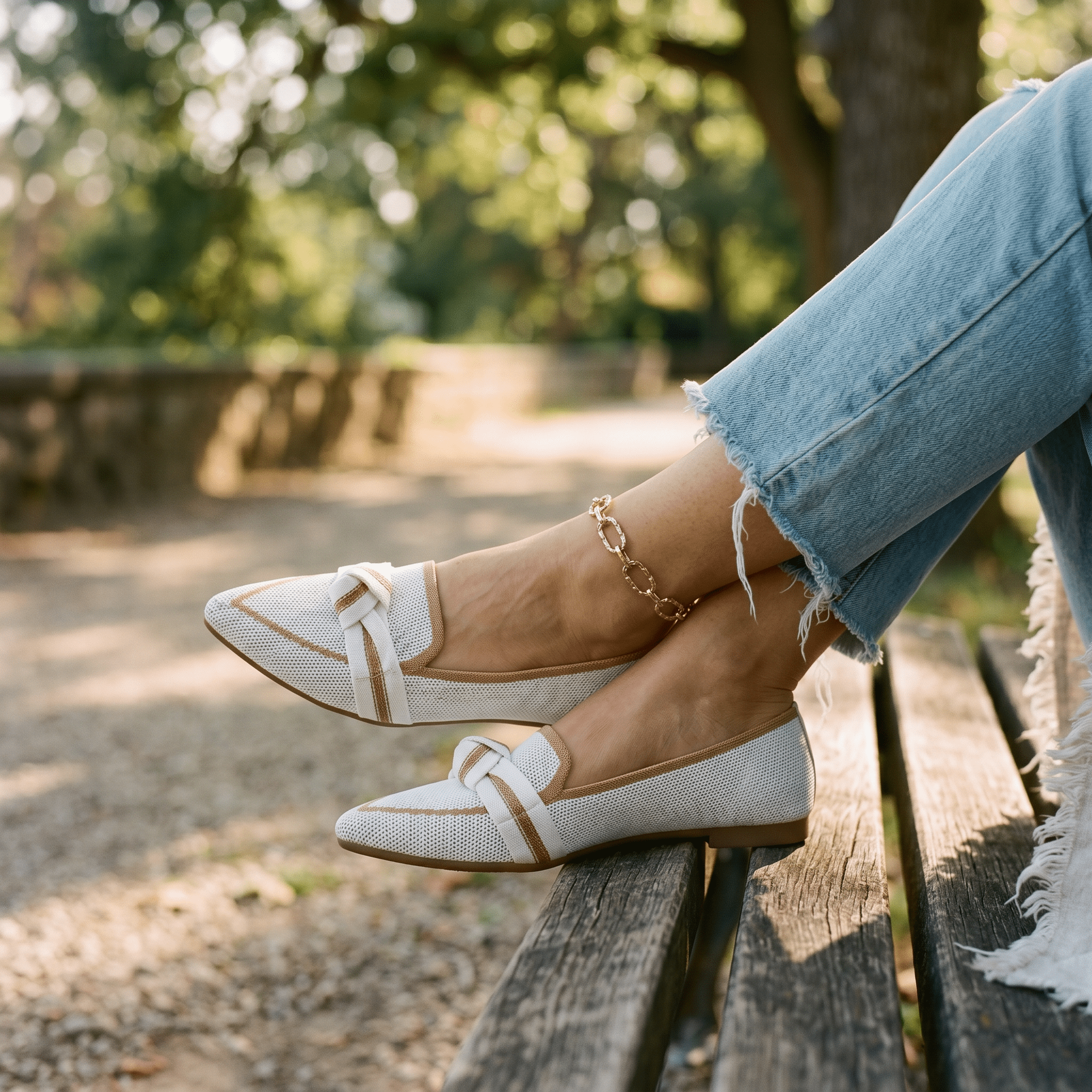 Women’s slip-on loafers in tan with bow strap detail and pointed toe