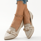 Light beige slip-on loafers with knit texture and knotted bow