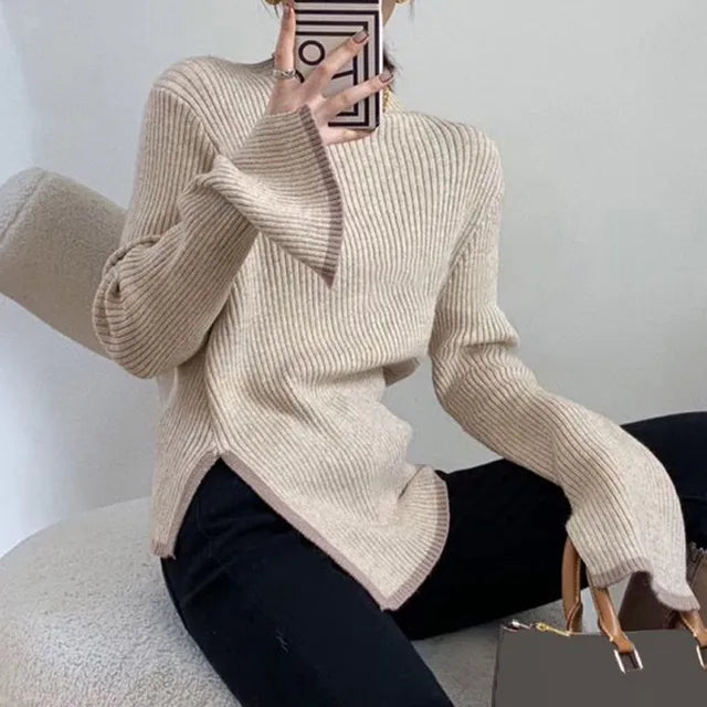 Light beige ribbed turtleneck sweater with contrast edge and side slit