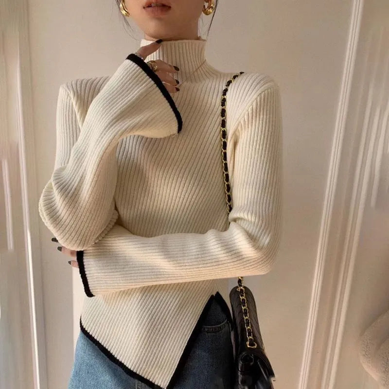 Cream ribbed high-neck sweater with contrast trim and side slit