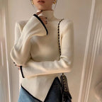 Cream ribbed high-neck sweater with contrast trim and side slit