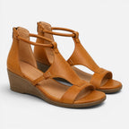 Brown wedge sandals with open toe and crisscross upper straps