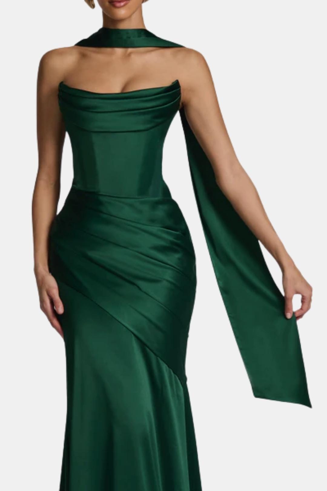 Emerald green satin long scarf with long trailing end, draped over the shoulder