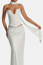 Ivory satin long scarf with narrow ends, draped diagonally across the front