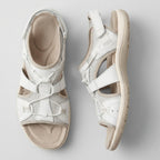 White orthopedic sandals with contoured footbed and adjustable straps