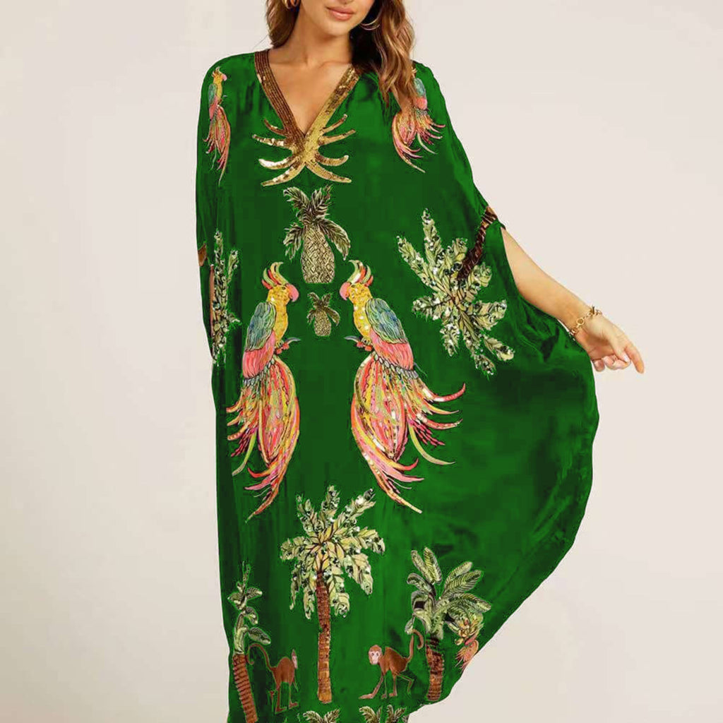 Green kaftan-style dress with parrot and palm tropical print, V-neck, relaxed long drape
