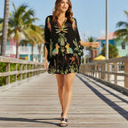 Black kaftan-style dress with tropical bird and palm print, V-neck, short loose hem