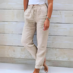 Beige relaxed drawstring casual pants with pockets and gathered ankle cuffs