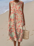 Floral midi dress in coral and cream, sleeveless with scoop neckline and gathered skirt.