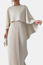 Milky white high-neck maxi dress with pleated bodice panel and layered cape sleeves