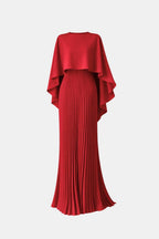 Red maxi dress back view with high neck and pleated long skirt under cape overlay