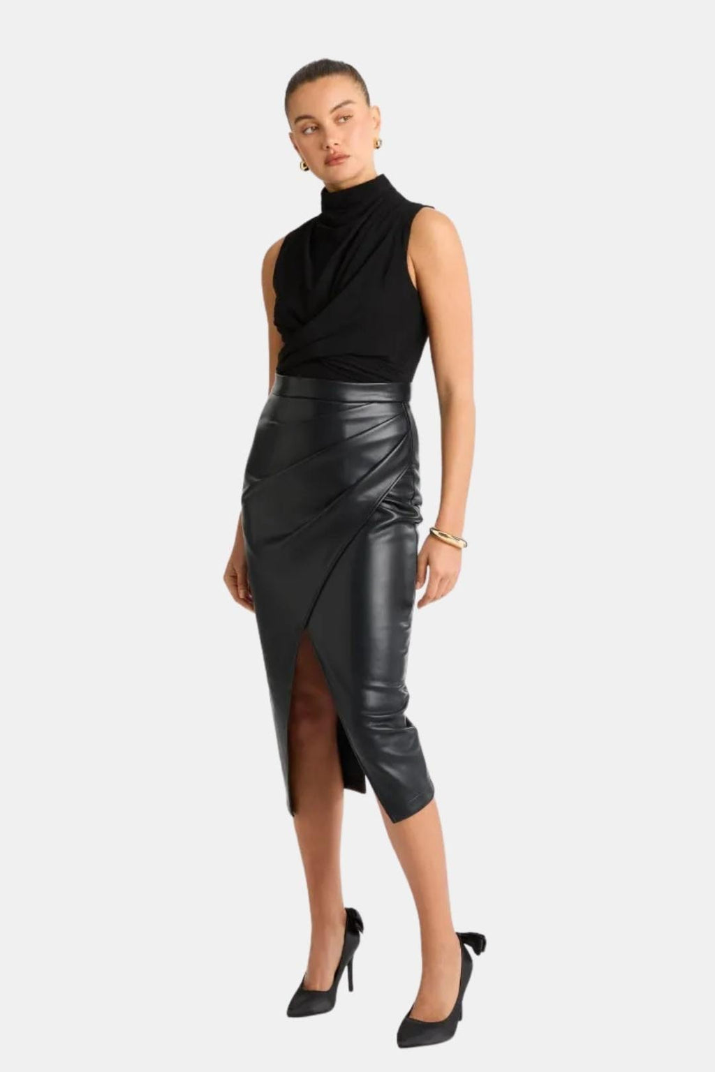 Black faux leather midi skirt with front split and wrap-style pleats