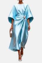 Sky blue satin maxi dress, boat neck, wide sleeves, front twist with jeweled brooch