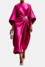 Rose satin maxi dress, boat neck, wide sleeves, front twist with jeweled brooch
