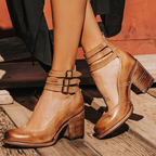 Brown women’s Mary Jane chunky heels with buckled ankle strap and block heel