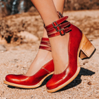 Red Mary Jane chunky heels with double buckle strap and chunky wooden-look heel.