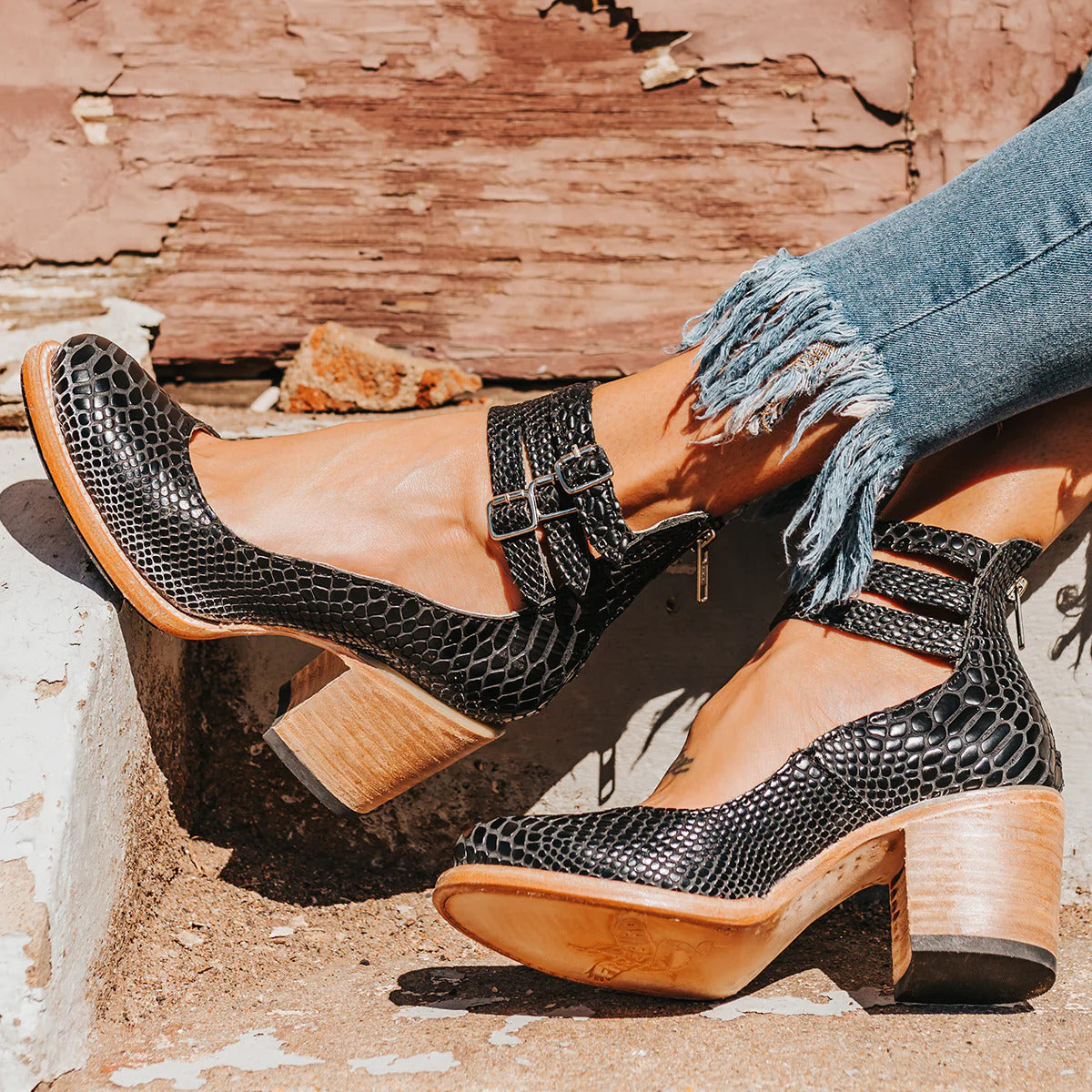 Black snake-print women’s Mary Jane chunky heels with buckled ankle strap and block heel