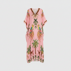 Pink kaftan-style dress with tropical parrot and palm print, V-neck, ankle length