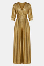 Gold V-neck jumpsuit with ruched waist, long puff sleeves, and wide-leg pants