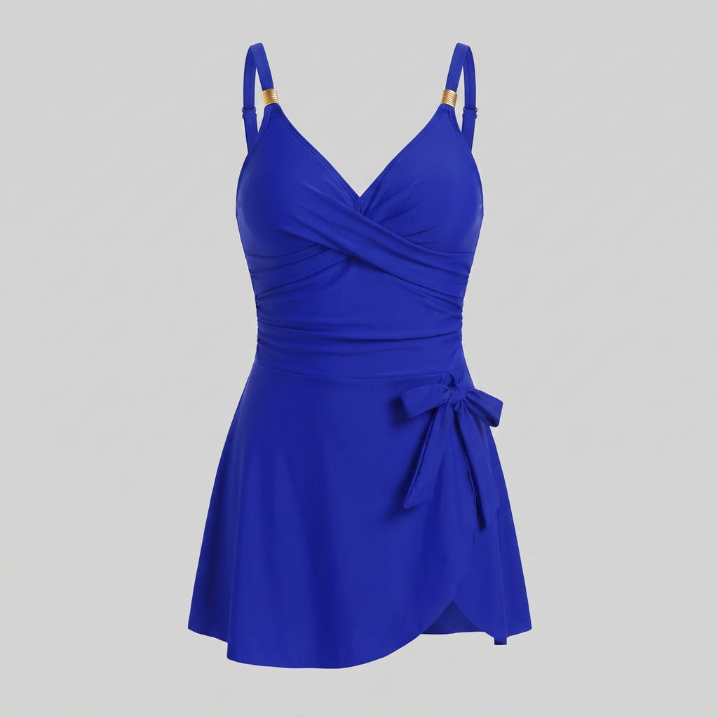 Royal blue one-piece swimdress with surplice bust, ruched tummy control, tie-front skirt, straps