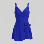 Royal blue one-piece swimdress with surplice bust, ruched tummy control, tie-front skirt, straps