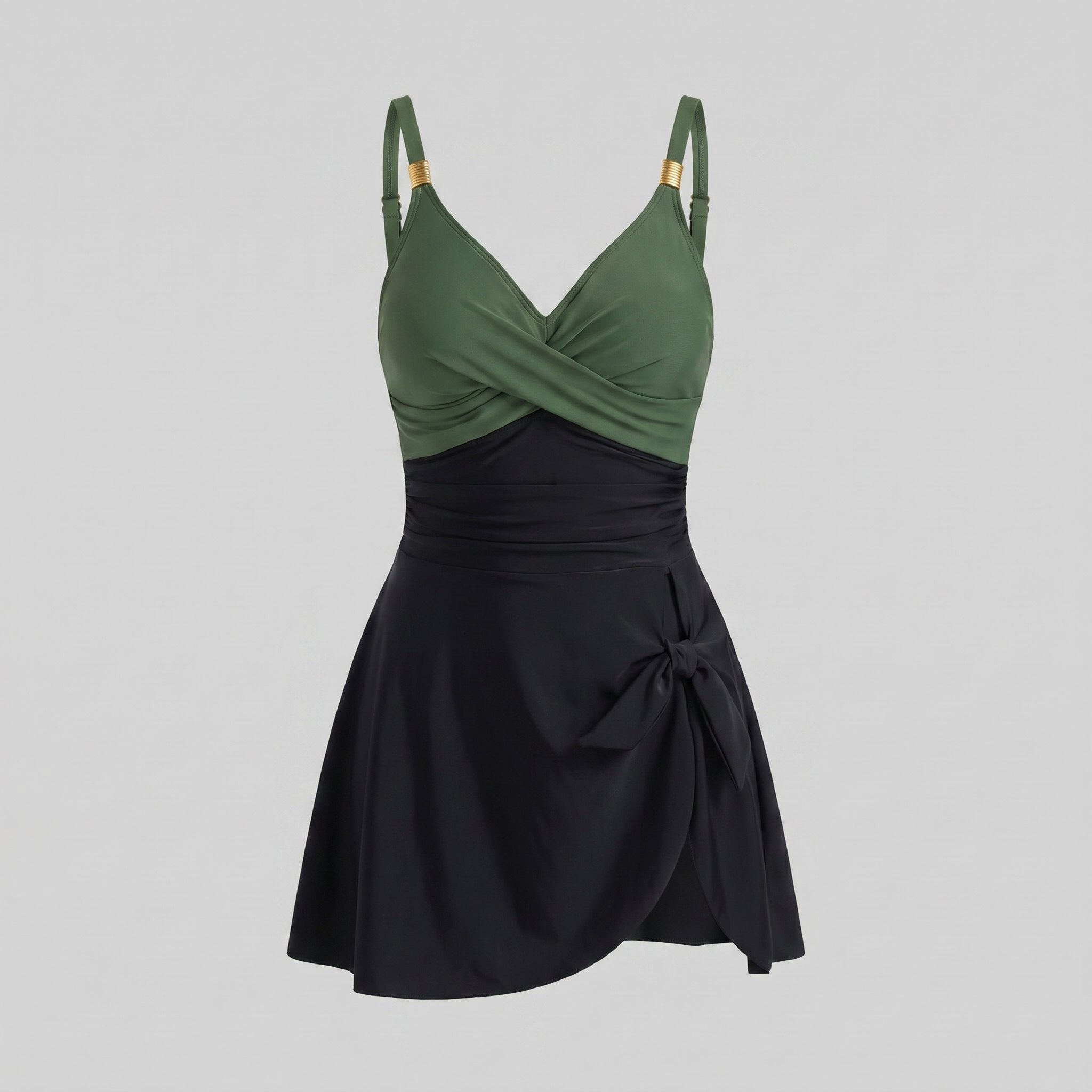 Black and dark green one-piece swimdress with surplice bust, ruched tummy control, tie-front skirt
