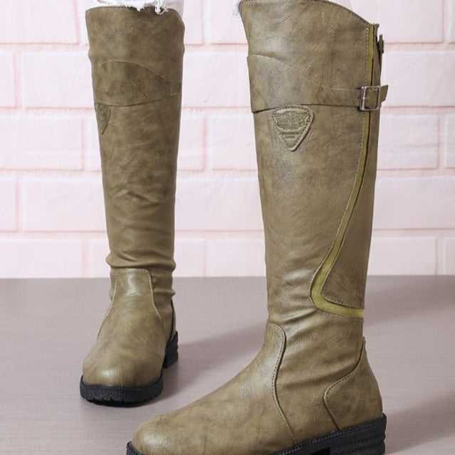 Knee-high olive boots with side buckle strap and stacked lug sole
