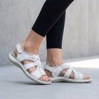White orthopedic sandals with contoured footbed and adjustable straps