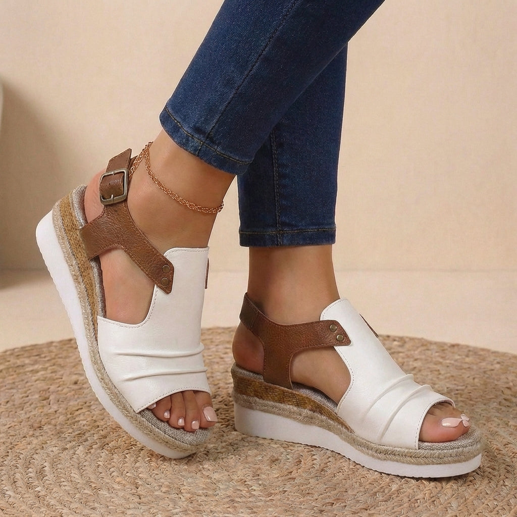 White and brown platform orthopedic sandals with buckled ankle strap and open toe