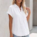 White button-up blouse with collar, front buttons, chest pocket, short sleeves