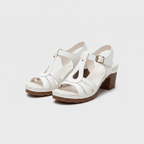 White women's T-strap sandals with block heel and cushioned footbed, buckle ankle strap