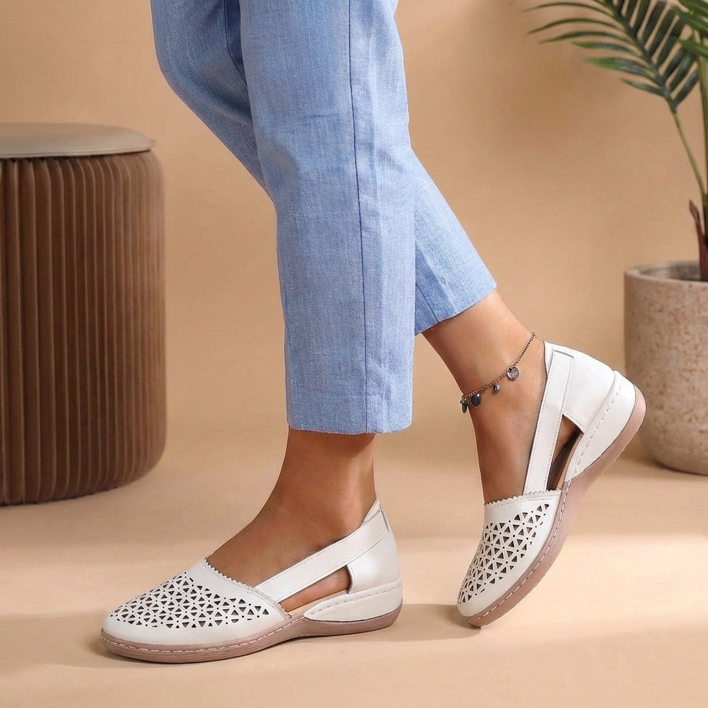 Women's slip-on casual shoes in white with cutout design and open side