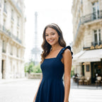 Dark blue fit-and-flare mini dress with square neckline and ruffle shoulder straps
