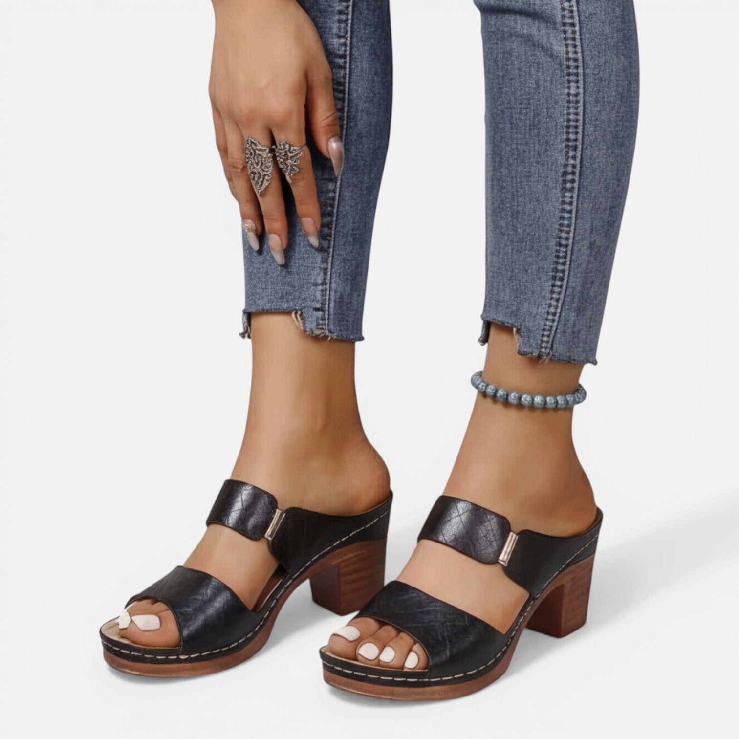 Black leather open-toe block heel sandals with two wide straps and back strap