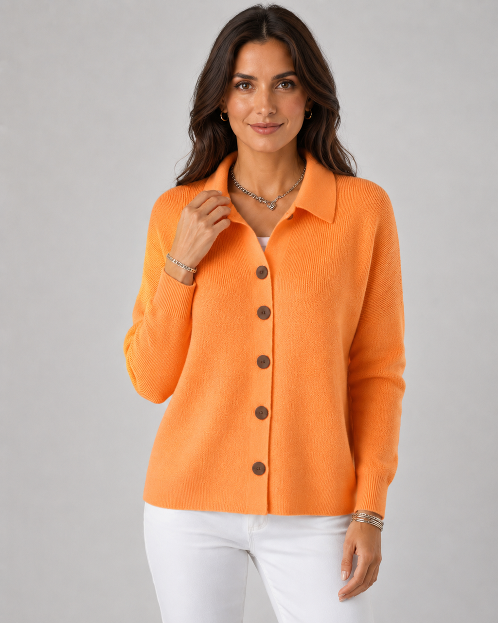 Orange collared button-up knit cardigan with long sleeves and front buttons
