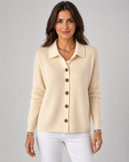 Cream collared knit button-up cardigan with long sleeves and front buttons