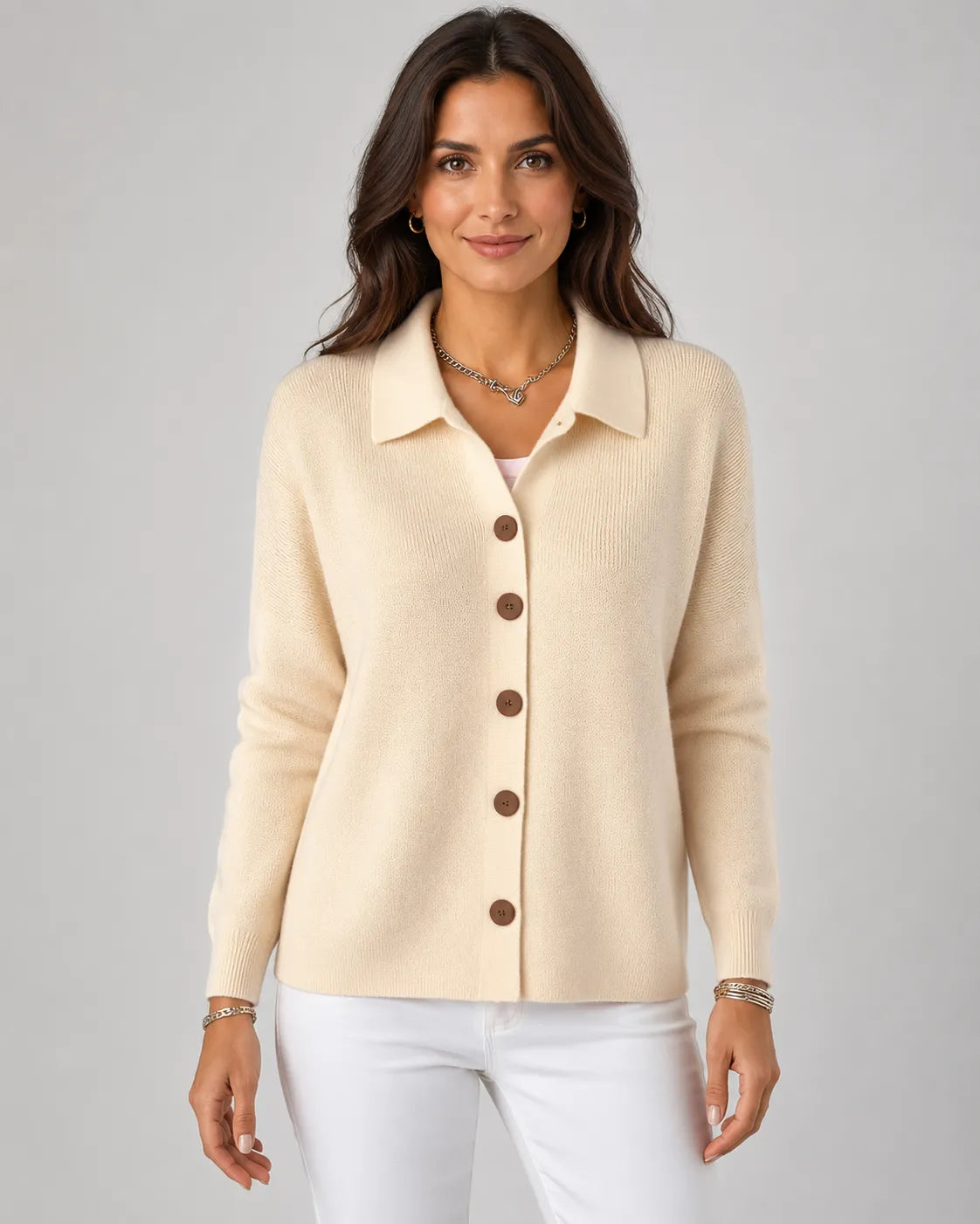 Cream collared knit button-up cardigan with long sleeves and front buttons