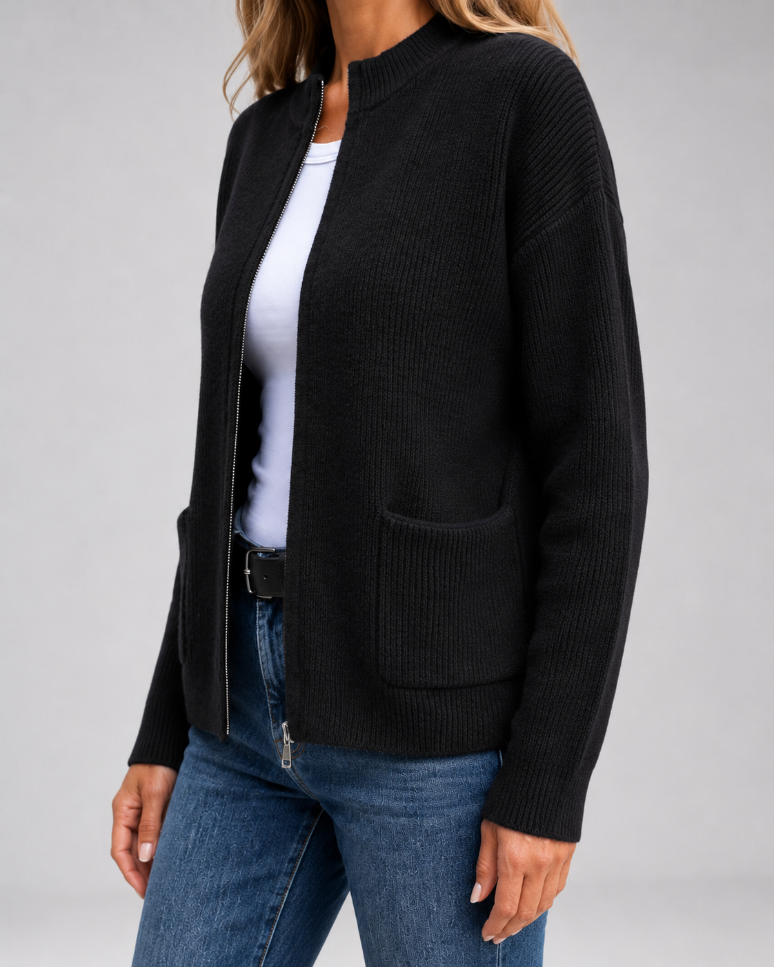 Black open-front knit cardigan with long sleeves and front patch pockets