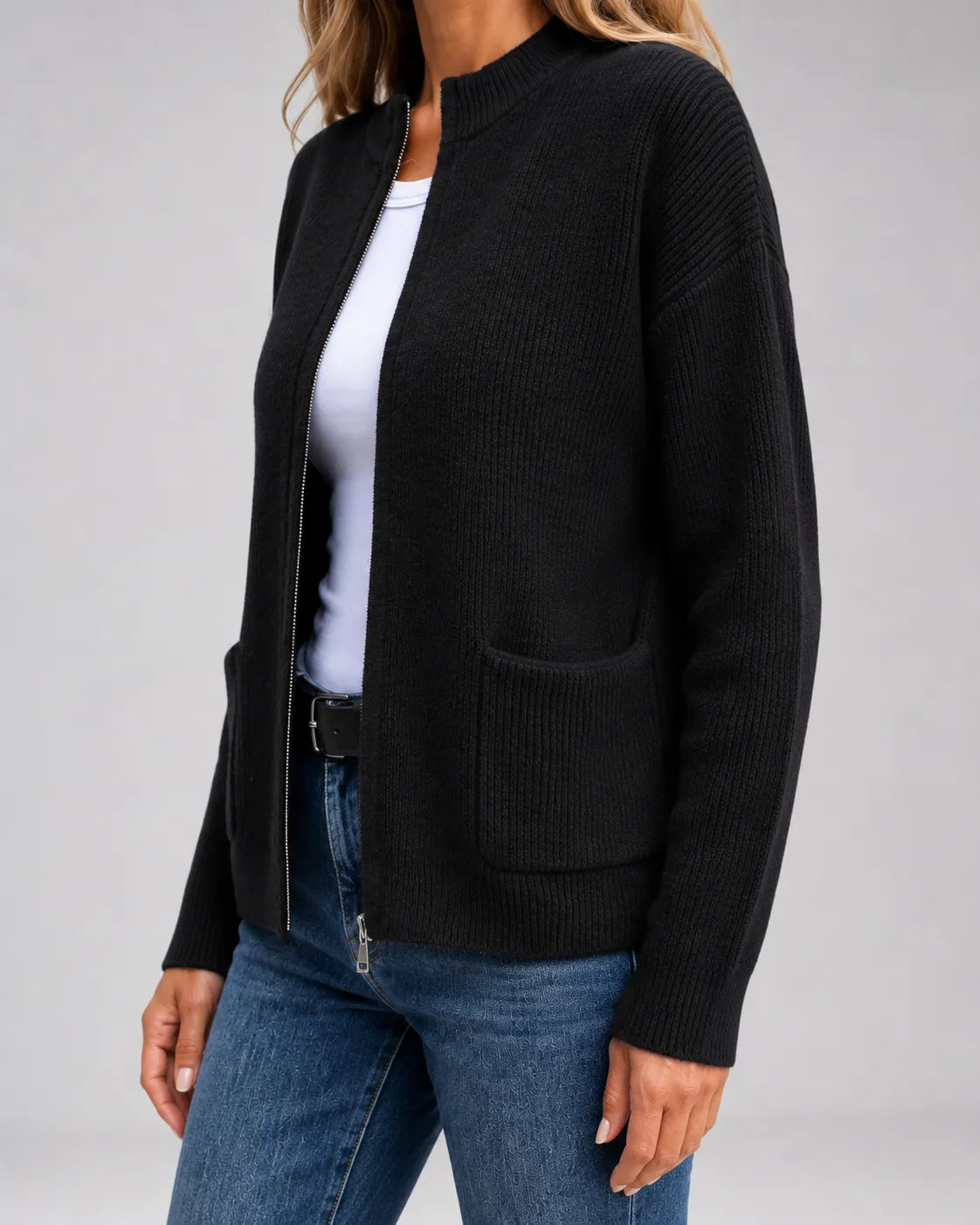 Black open-front knit cardigan with long sleeves and front patch pockets