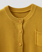 Yellow knit cardigan neckline with ribbed trim and gold button placket