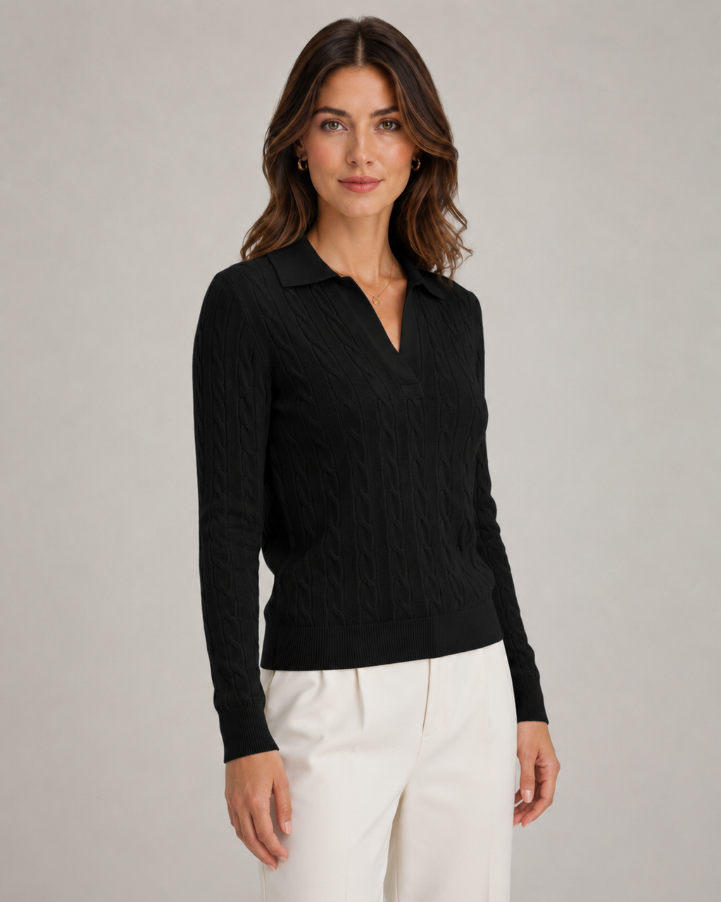 Black cable knit polo sweater with ribbed collar and button V placket