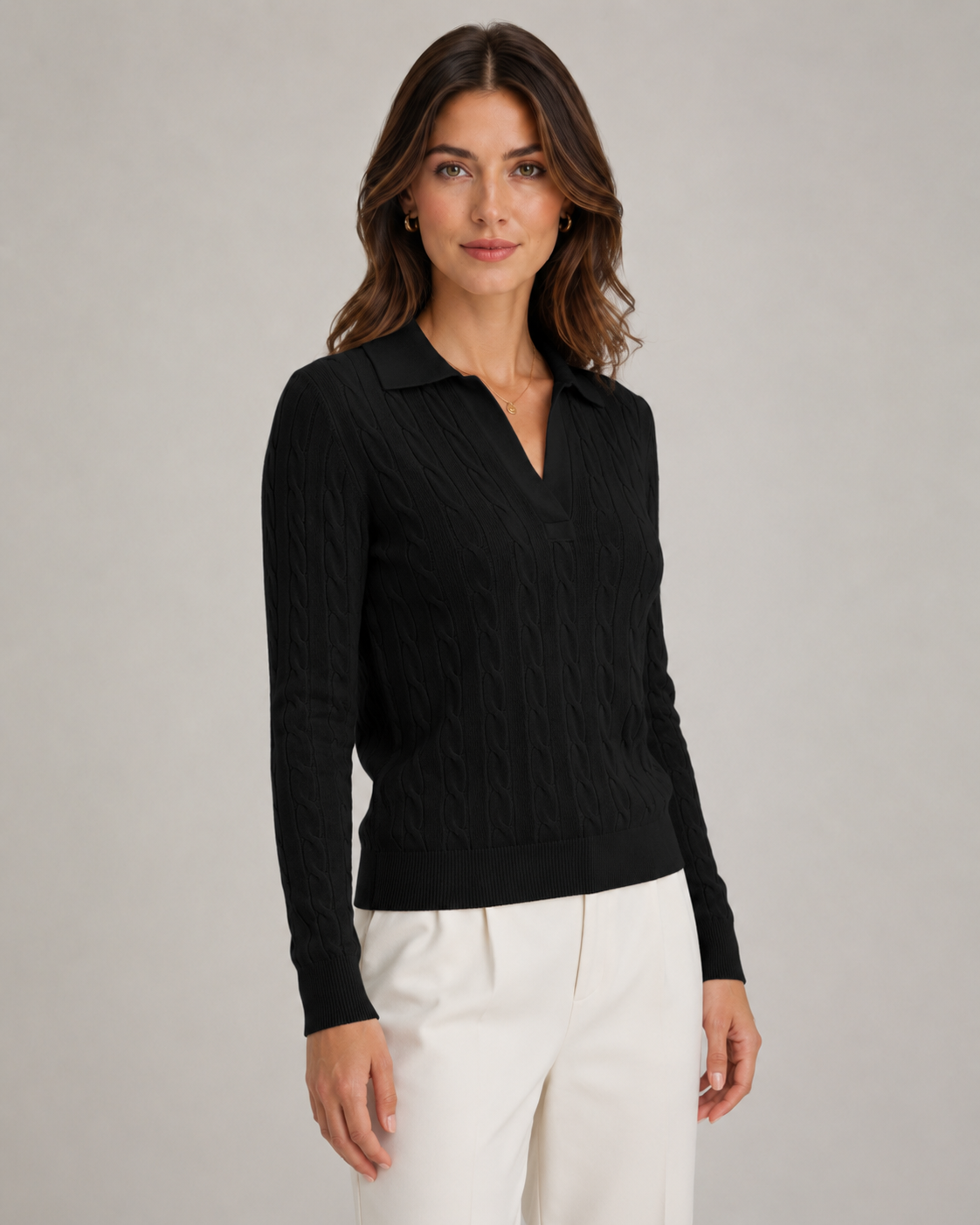 Black cable knit polo sweater with ribbed collar and button V placket