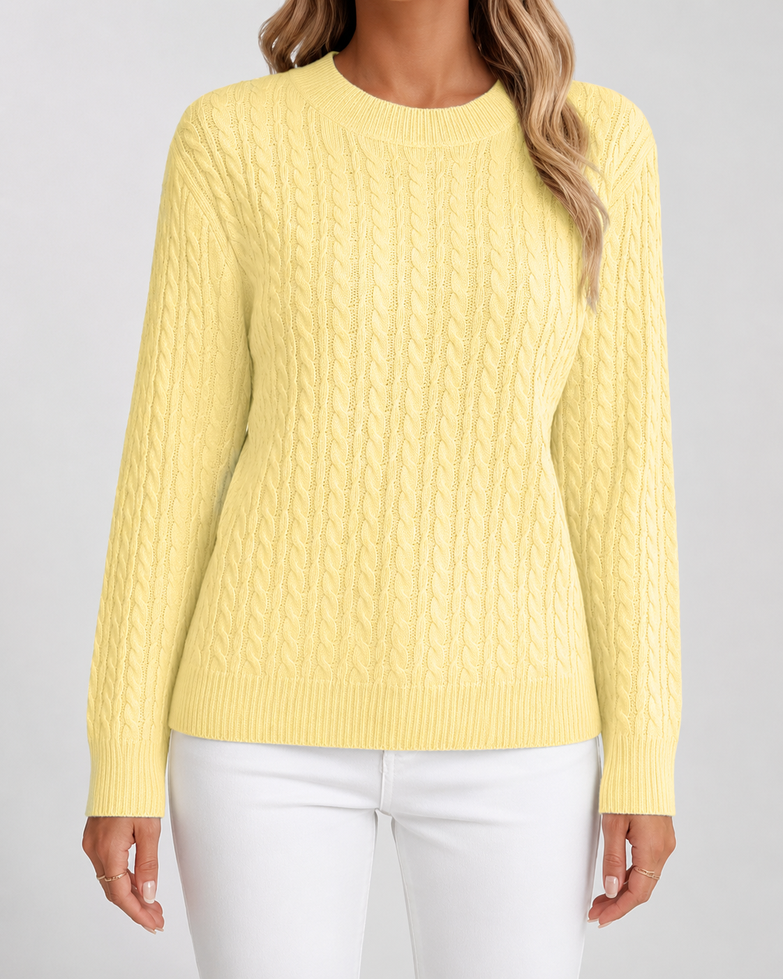 Women’s yellow cable knit crew neck sweater with long sleeves and ribbed hem