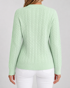 Women’s mint green cable knit crew neck sweater with textured back and ribbed hem