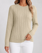 Women’s beige cable knit crew neck sweater with long sleeves and ribbed cuffs