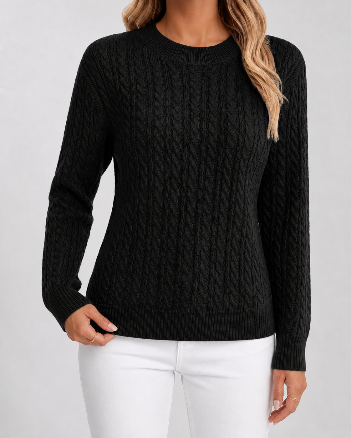 Women’s black cable knit crew neck sweater with long sleeves and ribbed hem