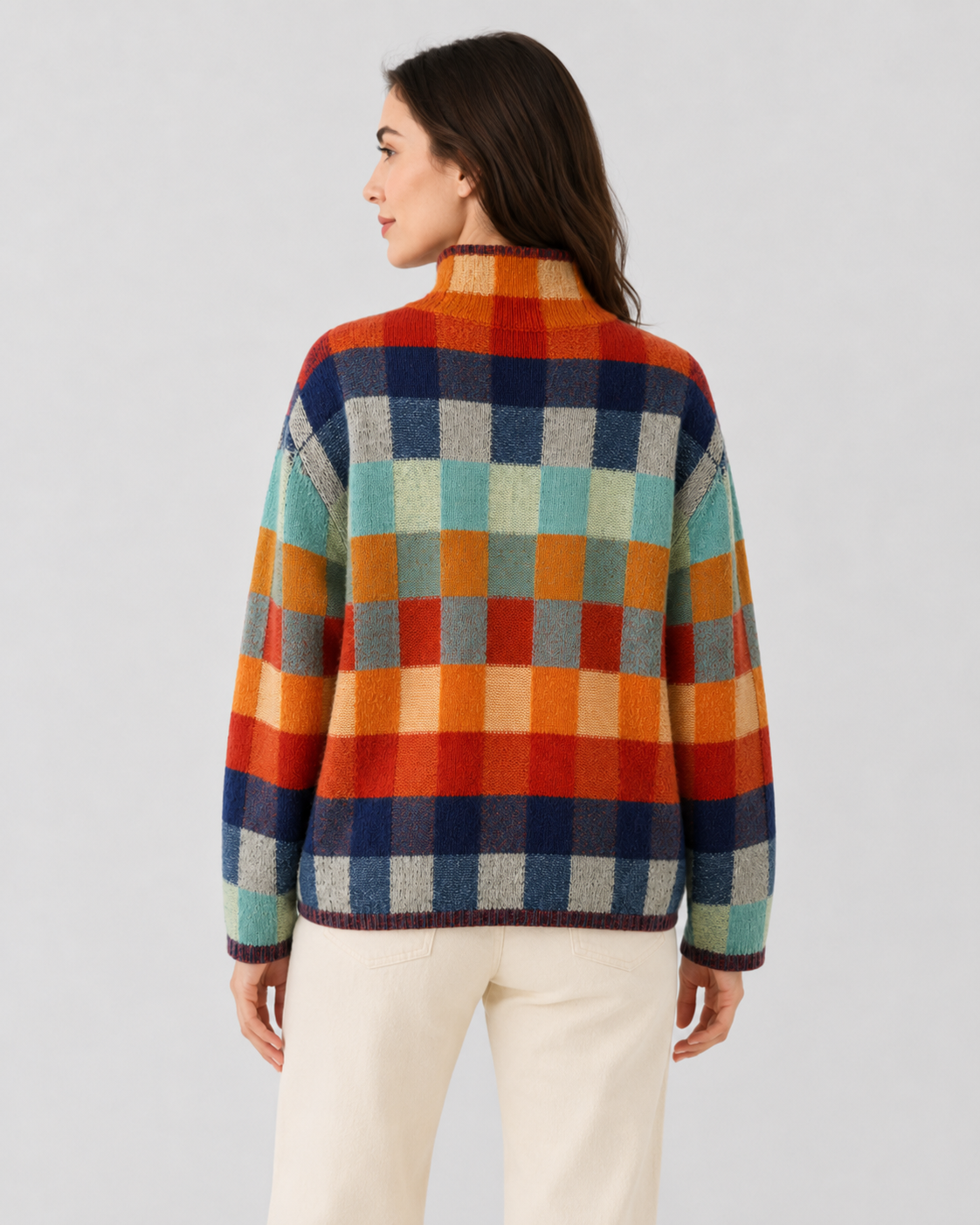 Women’s check knit turtleneck sweater, back view, multicolor block pattern with ribbed hem