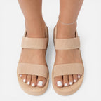 Women’s wedge sandals in beige with crisscross straps and silver ankle strap