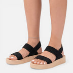 Women’s wedge sandals with open toe, black fabric straps and cushioned platform sole